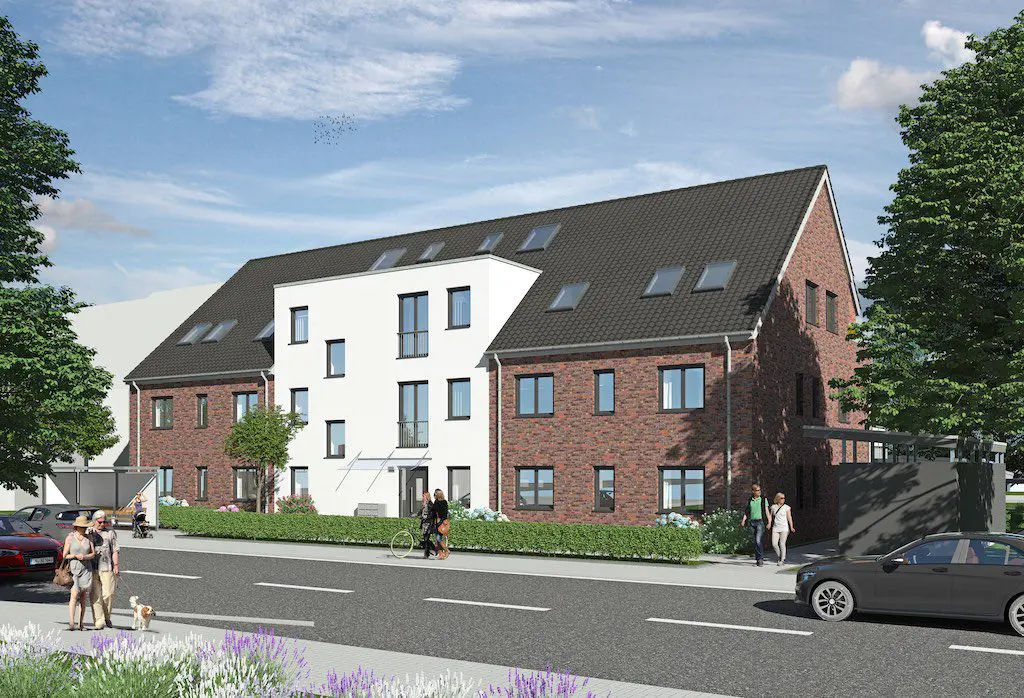 Ansicht eines modernen Mehrfamilienhauses mit Ziegel- und Putzfassade unter blauem Himmel.