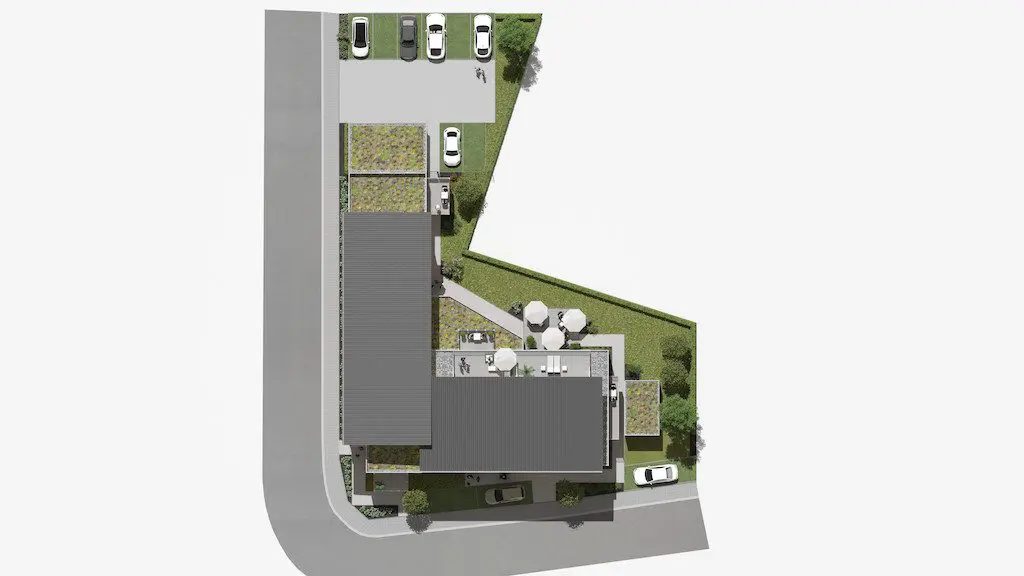 Draufsicht Lageplan: Wohngebäude mit Parkplätzen, Grünflächen und Dachterrasse, dargestellt als Illustration.